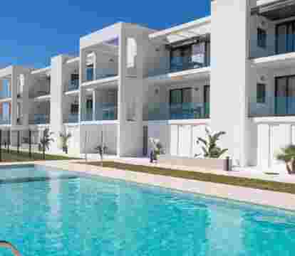Immerse yourself in a captivating blend of stunning vistas, pristine shorelines, and a serene coastal ambiance in the best apartments in Oliva